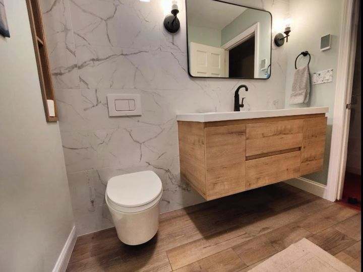 Wood vanity, wall-mounted toilet